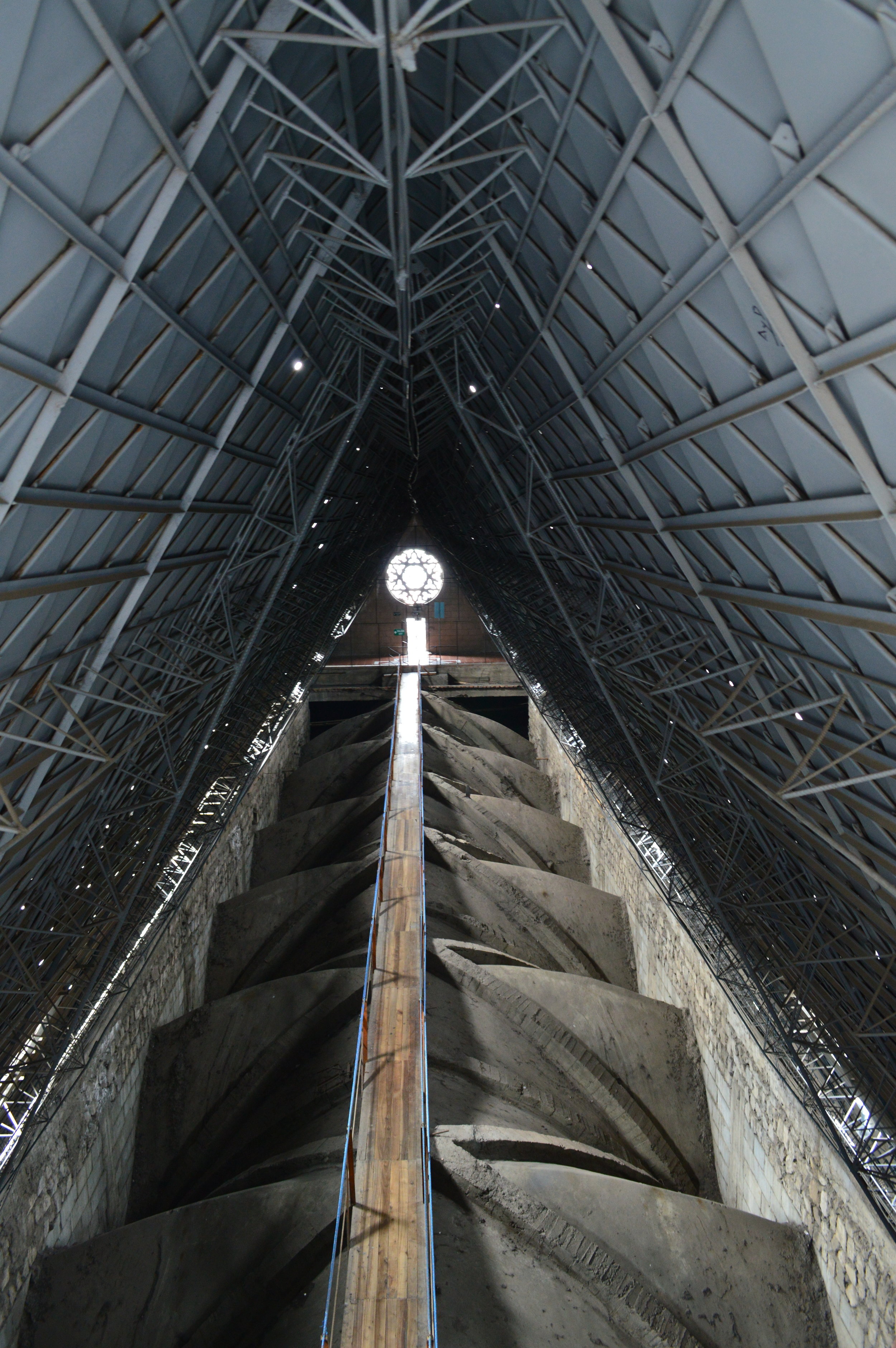 Walk through the attic to another set of stairs that leads you up to the top of the tower. 