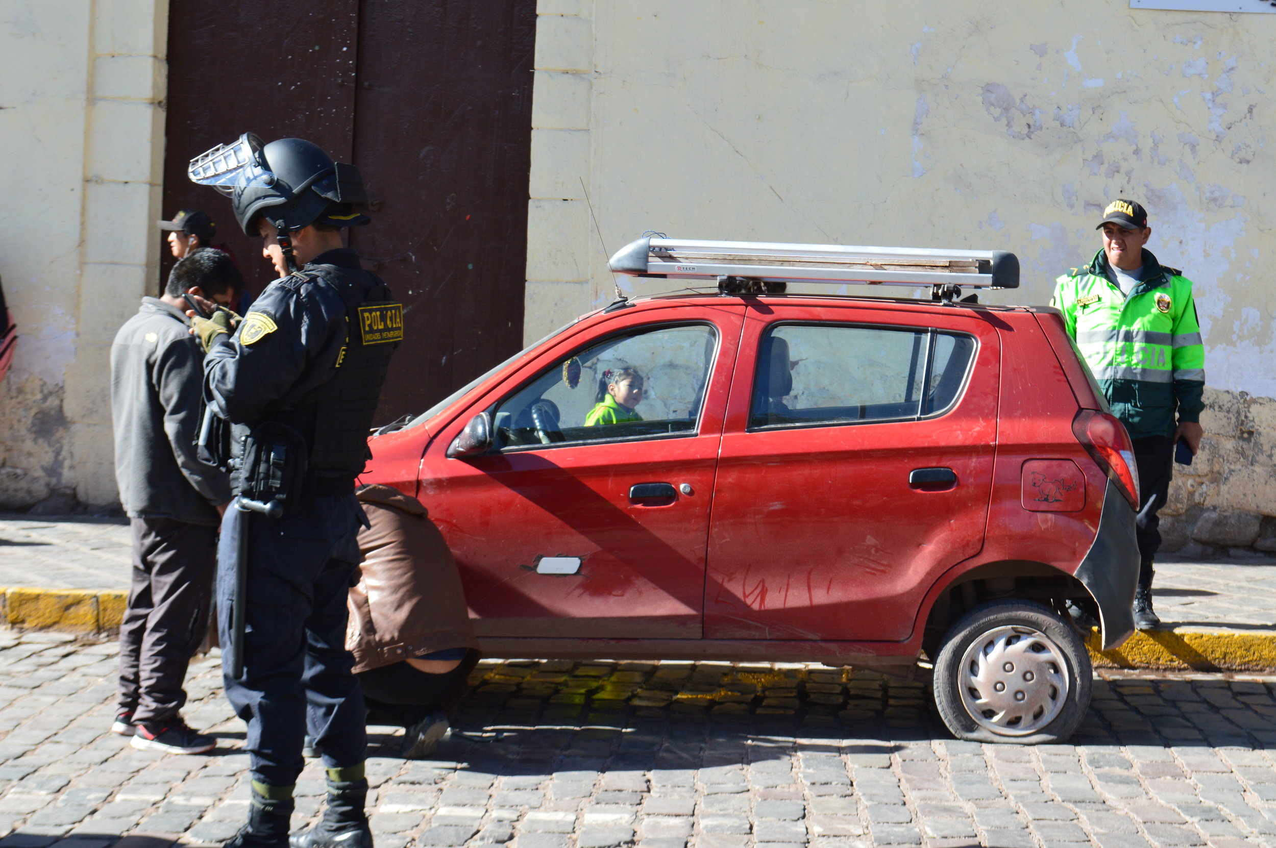 Someone slashed the tire of this taxi cab during the strike