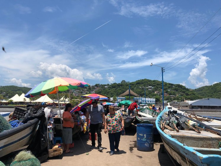  Fishing boats lining both sides of the pier 